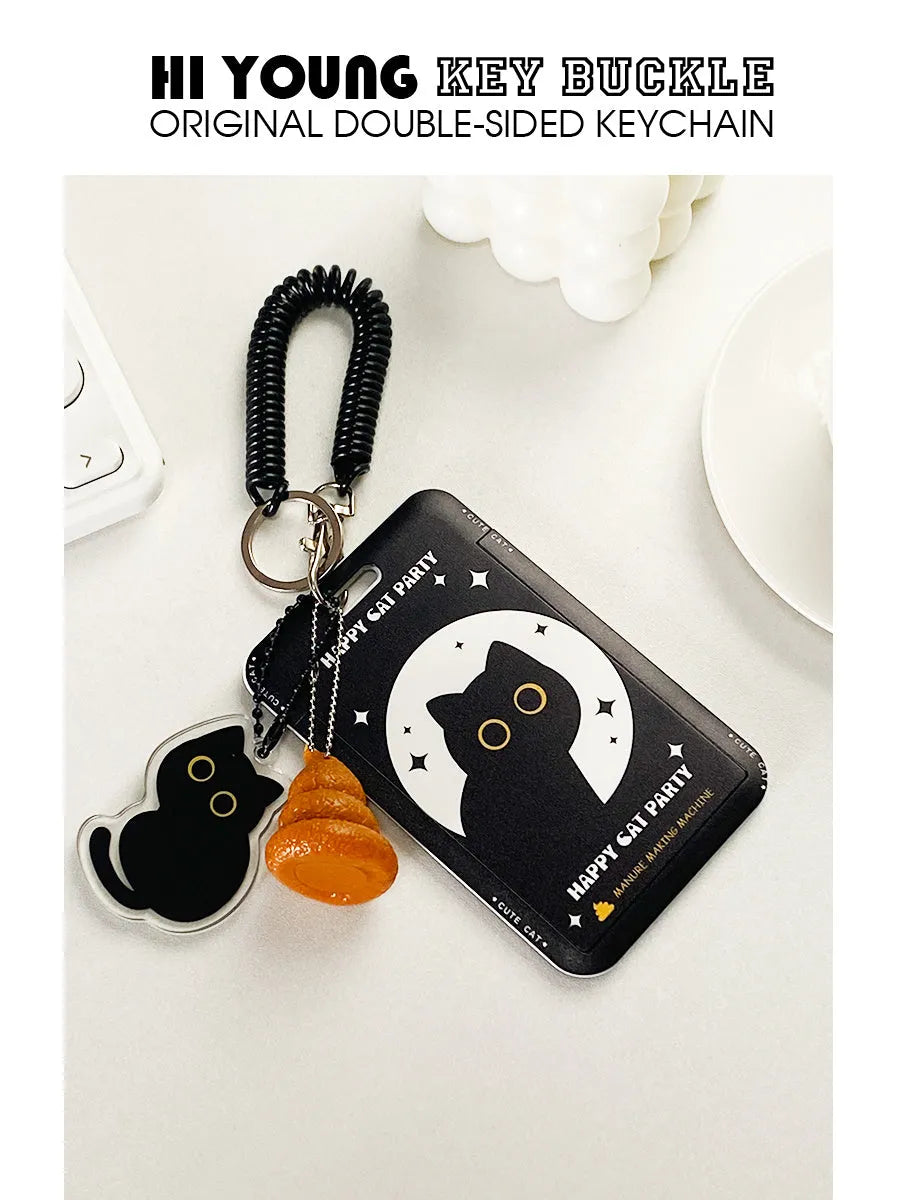 Plastic card sleeve with cartoon black cat design and attached ferrule pendant for keychain attachment