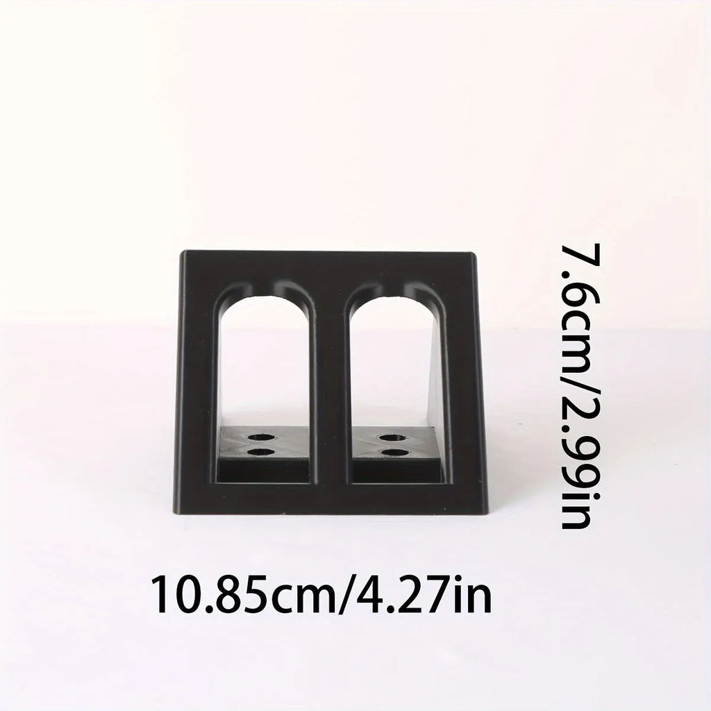 Black plastic punk-style pistol display stand for collectible models.
