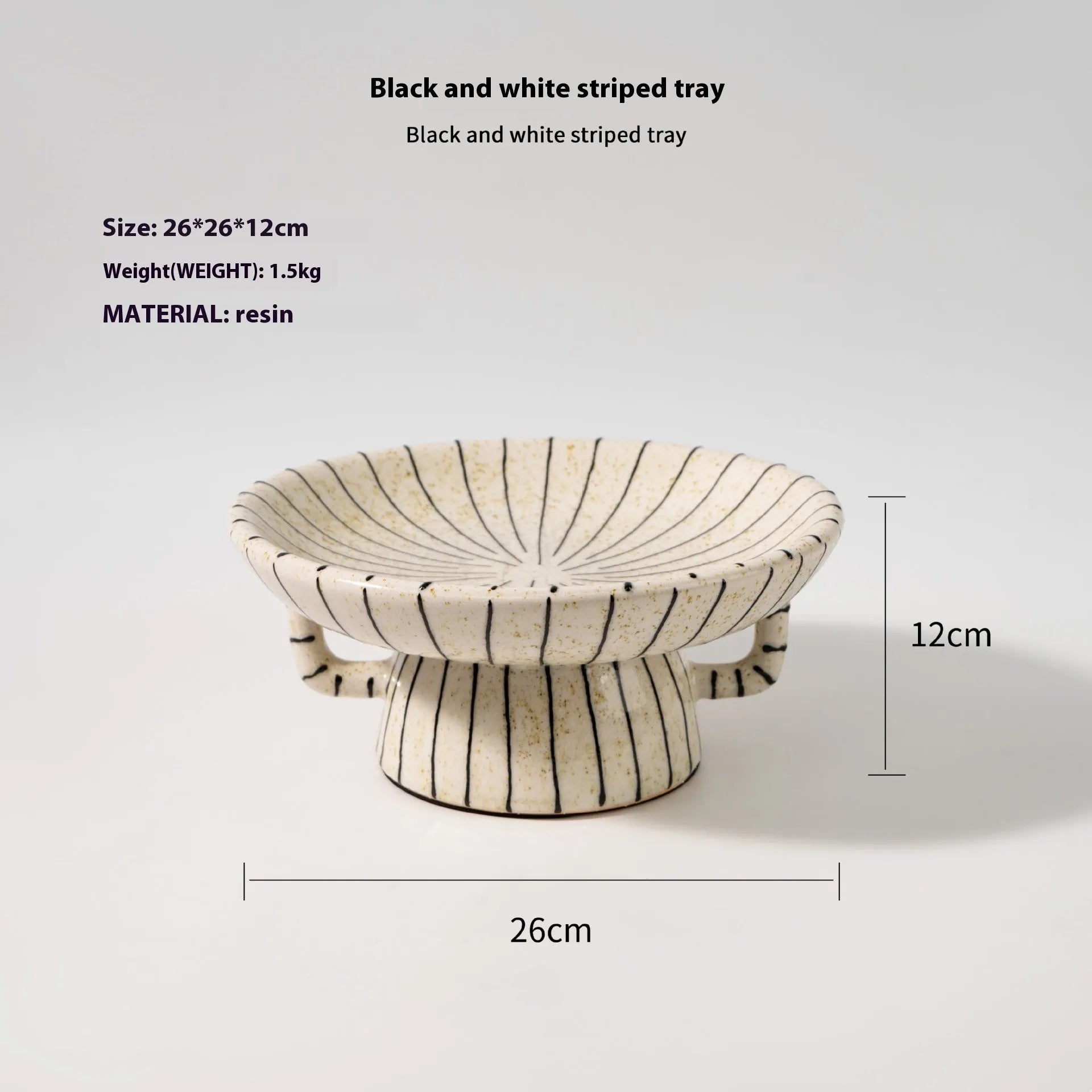Black and white striped retro resin fruit plate on a table.