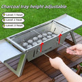Small foldable portable charcoal grill with iron construction for outdoor barbecues