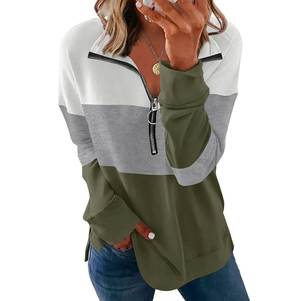 Women's loose long-sleeved leopard print sweater in green on a hanger.
