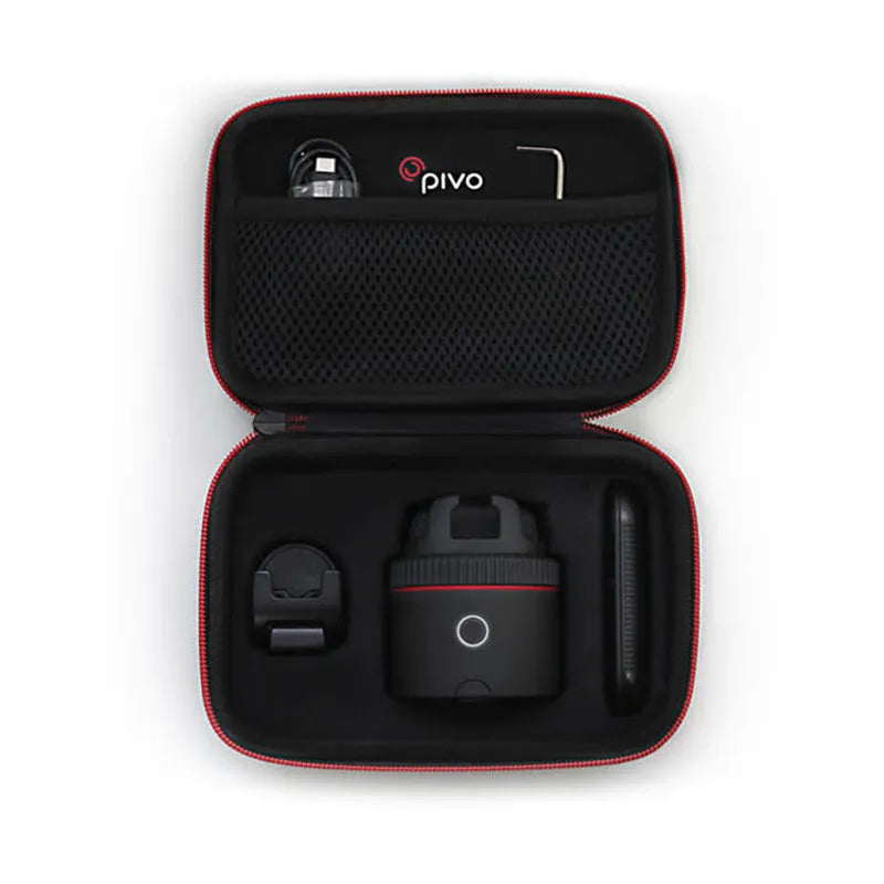 Black PIVO facial tracking smartphone mount on a table, showing 360-degree rotation mechanism.