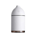 White ultrasonic aromatherapy diffuser and humidifier with LED light and 300ml capacity.