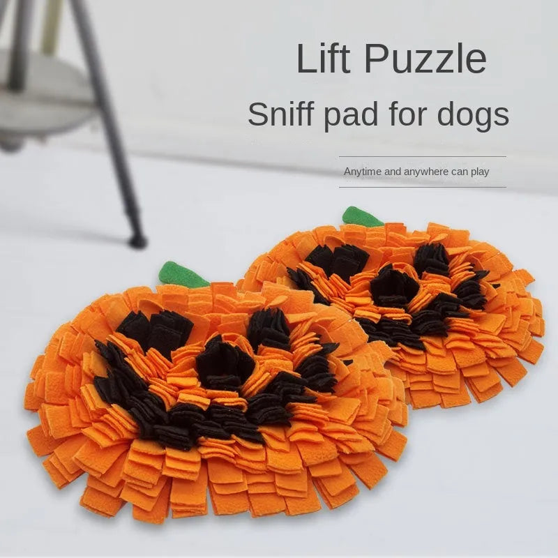 Orange pumpkin-shaped dog sniffing mat with textured fur surface for slow feeding