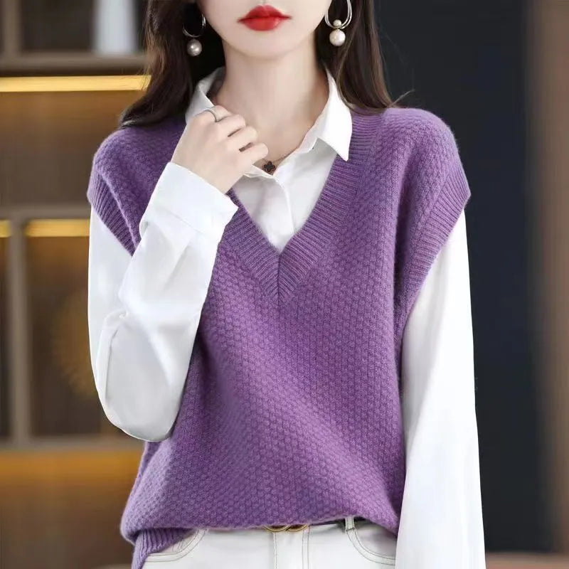 Women's creamy-white v-neck sleeveless pullover vest with a raised 3D knitted pattern texture