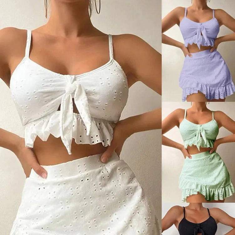 Women's three-piece bikini swimsuit with split hip skirt in solid colour