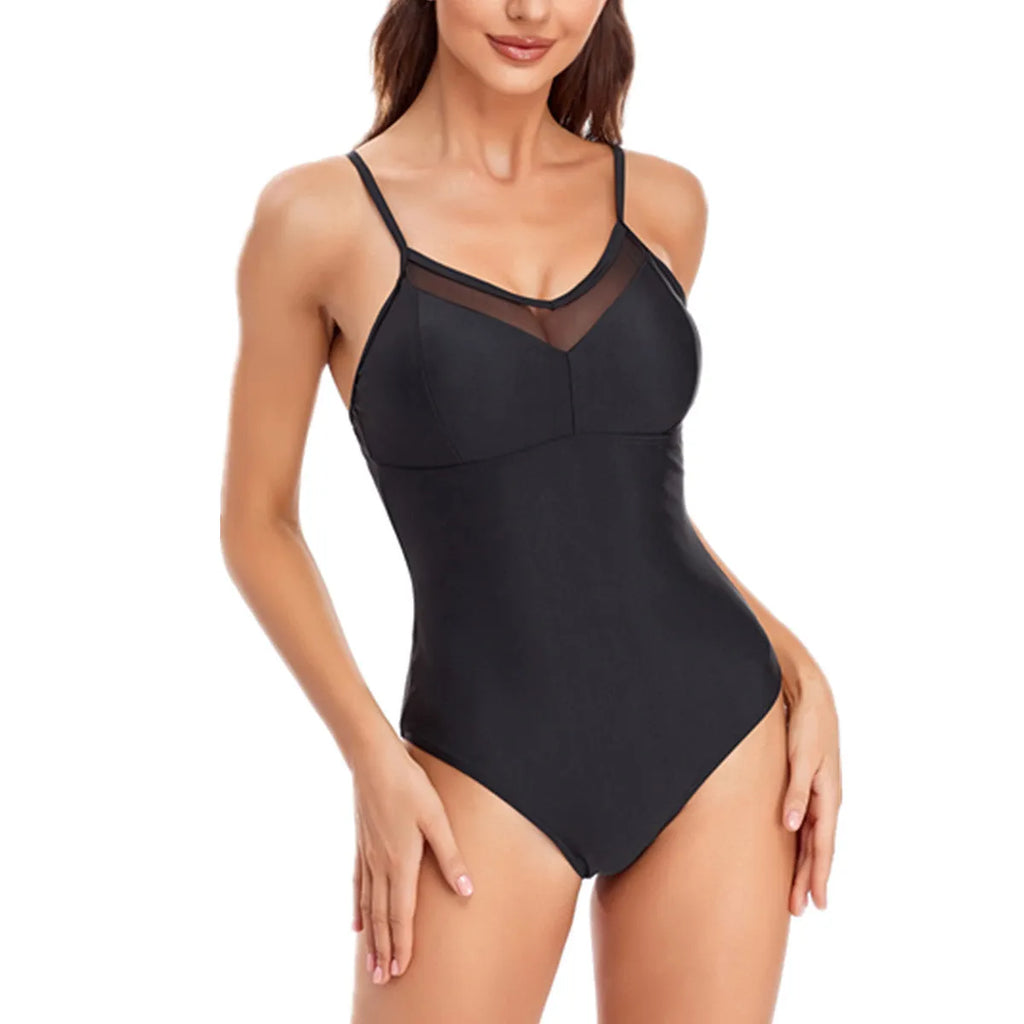 Women's solid colour backless one-piece swimsuit made from spandex on a neutral background.