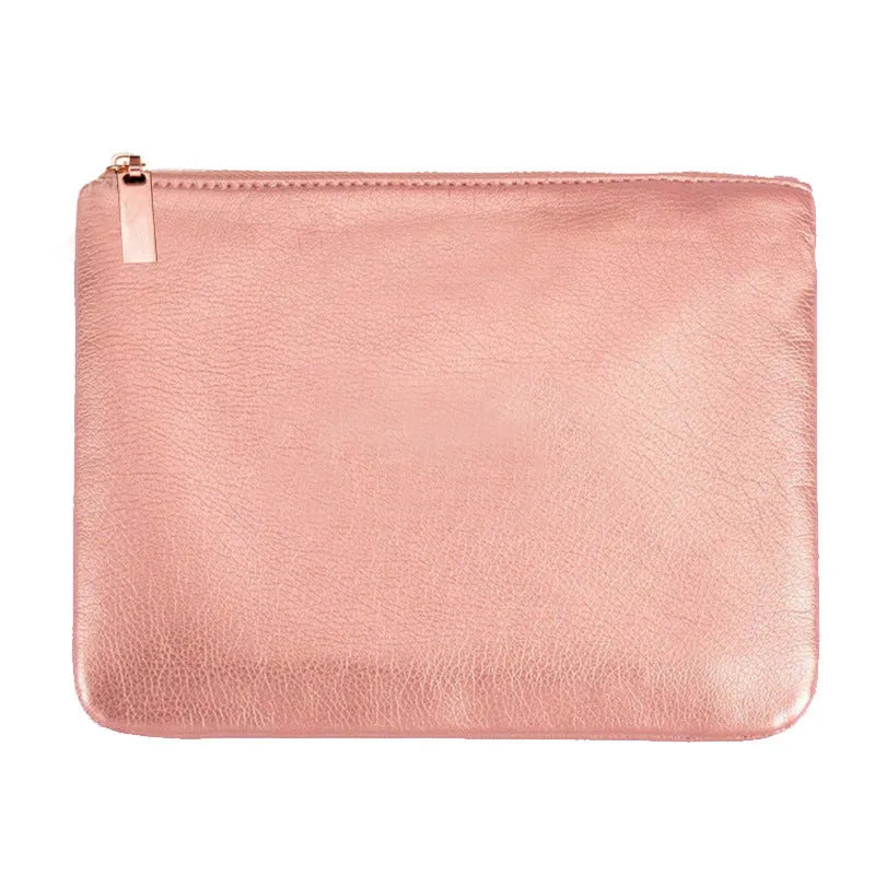 15-piece rose gold makeup brush set with bag, synthetic hair and wood handles on pink background