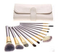 Persian make-up brush set with rice white bristles and champagne handles in 12, 18, or 24 brush options.