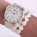 Ladies Geneva flower dial quartz watch with crystal diamond bezel and bracelet strap in black, blue, coffee, red or white