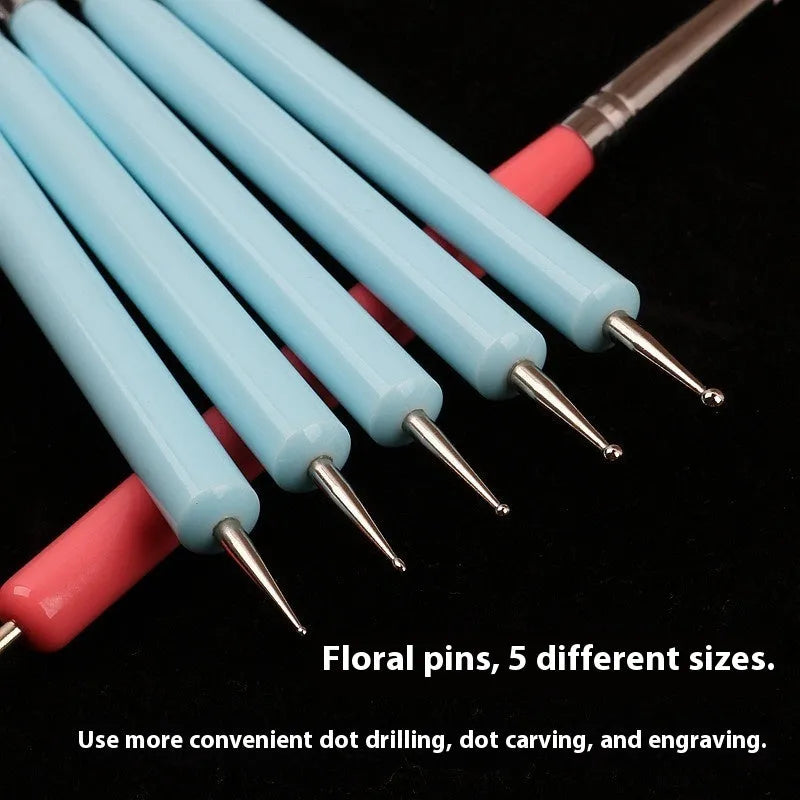 Five blue silicone double point drill pens in a manicure and painting pen set for nail art and craft use