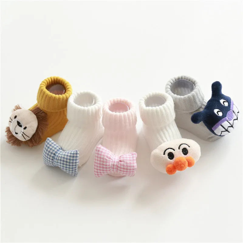 Cotton baby floor socks with anti-slip soles in animal designs for infants and toddlers