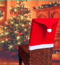 Christmas chair cover set with Santa Claus, Snowman, and Santa Hat designs on dining chairs