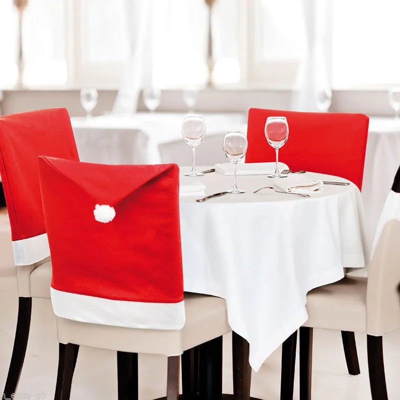 Christmas chair cover set with Santa Claus, Snowman, and Santa Hat designs on dining chairs