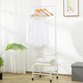 White iron single rod pulley storage car with clothes hanger on a wardrobe rail.