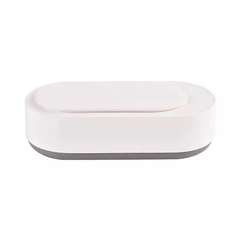 White portable ultrasonic cleaning machine with display and stainless steel tank.