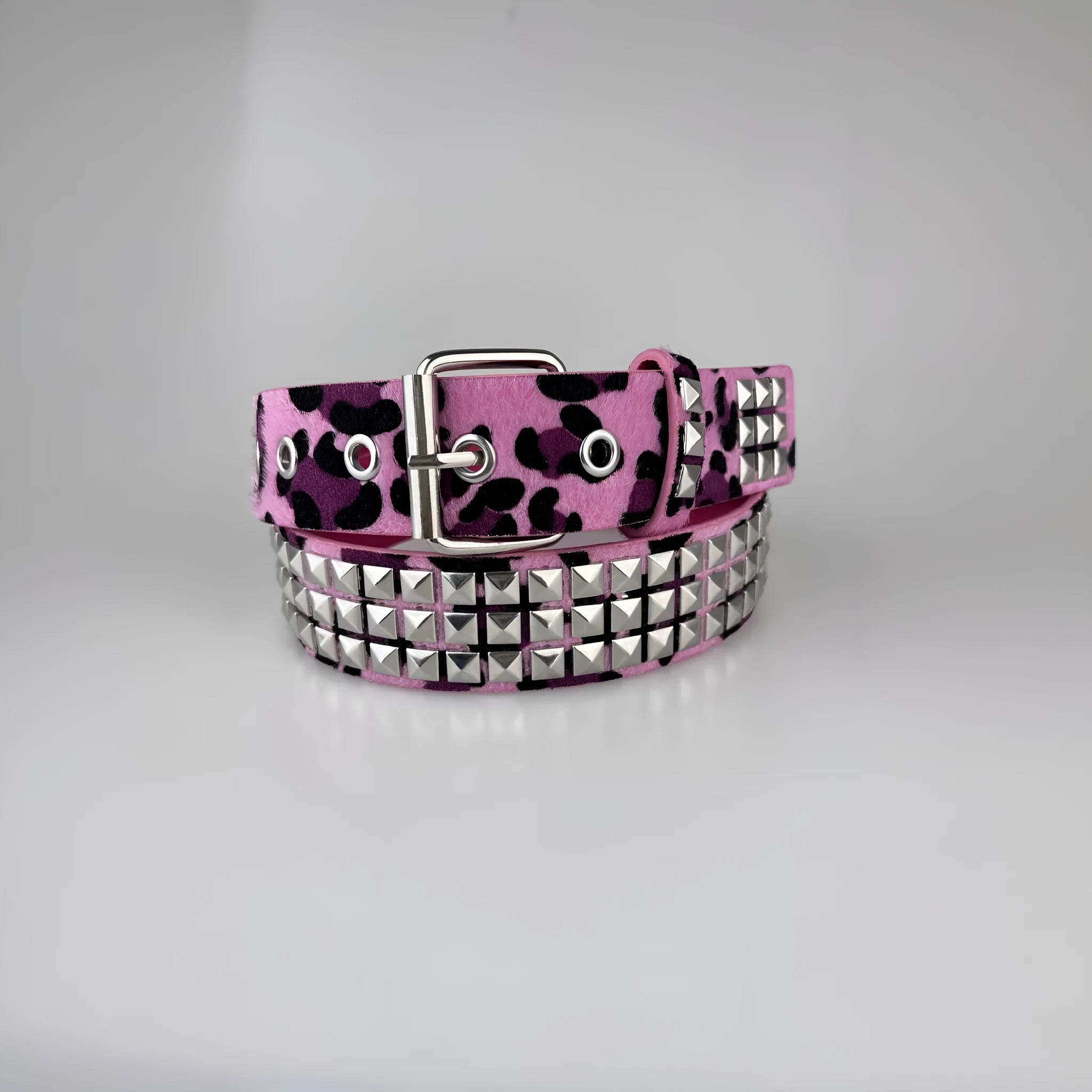 Punk women's PU leather belt with metal rivets and pyramid details in brown leopard, white zebra, or rose red patterns with alloy pin buckle