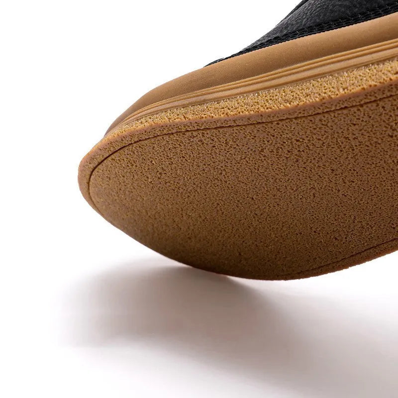 Men's black leather casual shoes with lace-up closure and round toe design