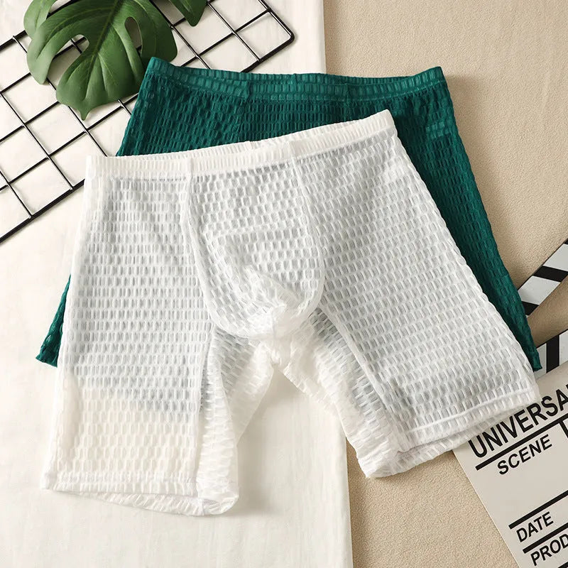 Men's solid colour lace boxer shorts in a hip-lifting, lengthened shaping style on a white background.