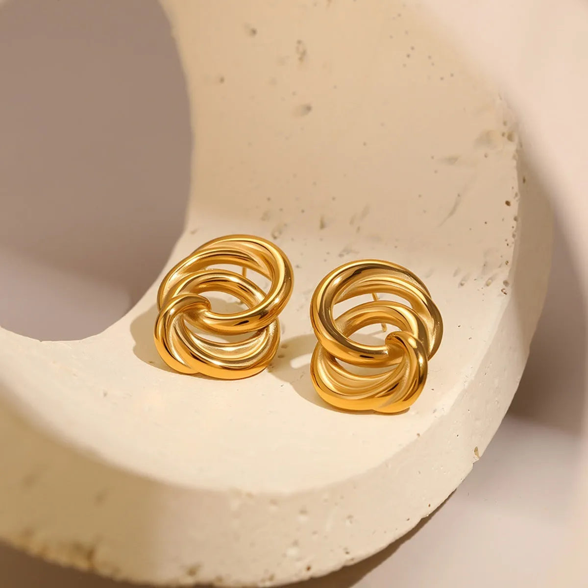 Minimalist geometric circle stud earrings in gold, stainless steel with electroplating and 18K purity