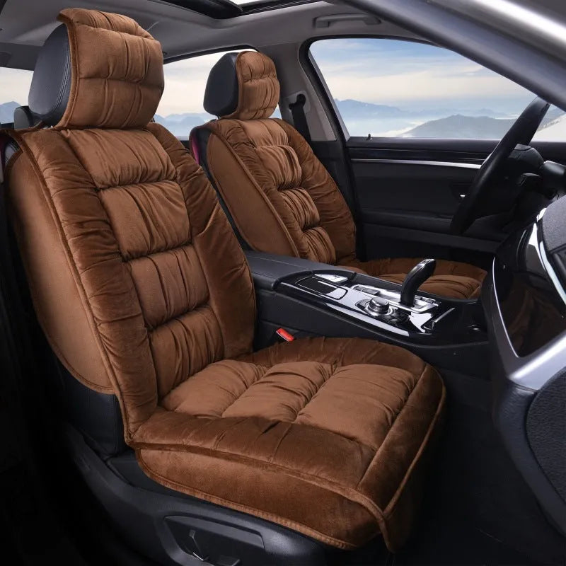 Plush winter car seat cushion shown in a grey set, with soft texture and fitting on a car seat.