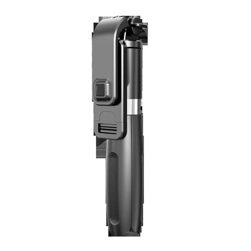 Extended black Bluetooth selfie stick with phone attached, showing wireless remote and tripod base deployed.