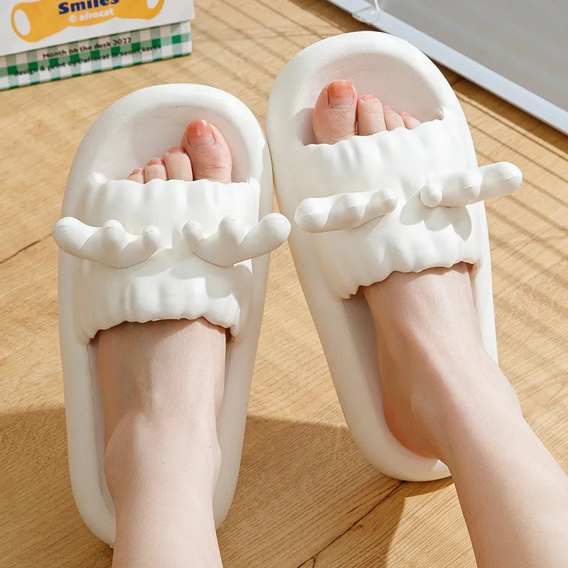 Deer horn design EVA flip-flop slippers in light yellow on a non-slip sole.