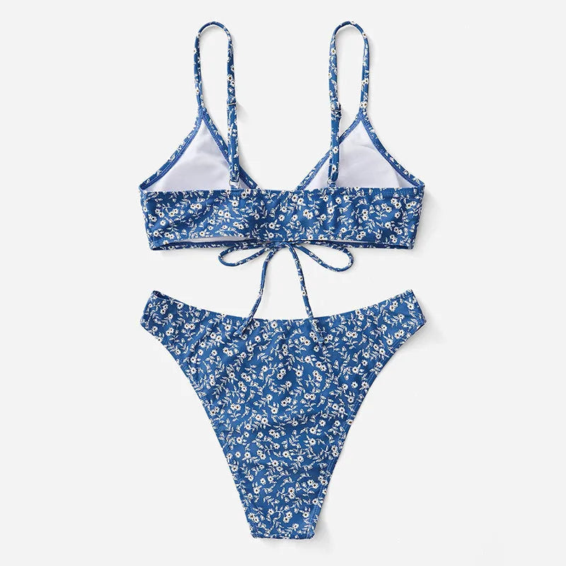 Blue polyester three-piece swimsuit set without underwire, showing separate top and shorts