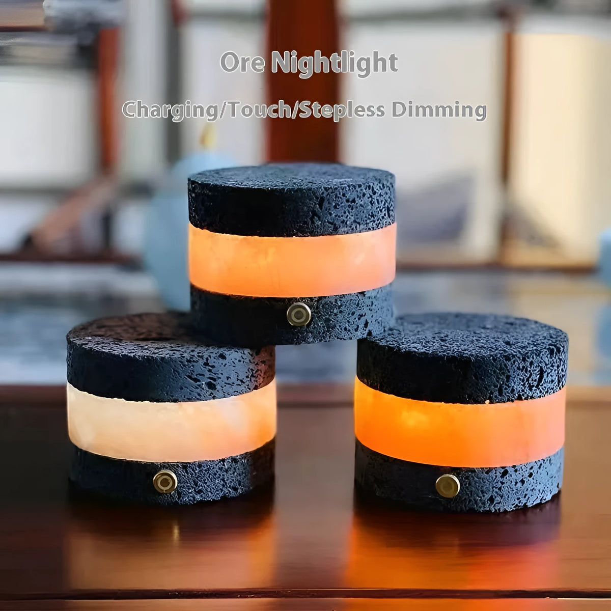 Small orange volcanic rock touch night lamp with USB port and essential oil reservoir.