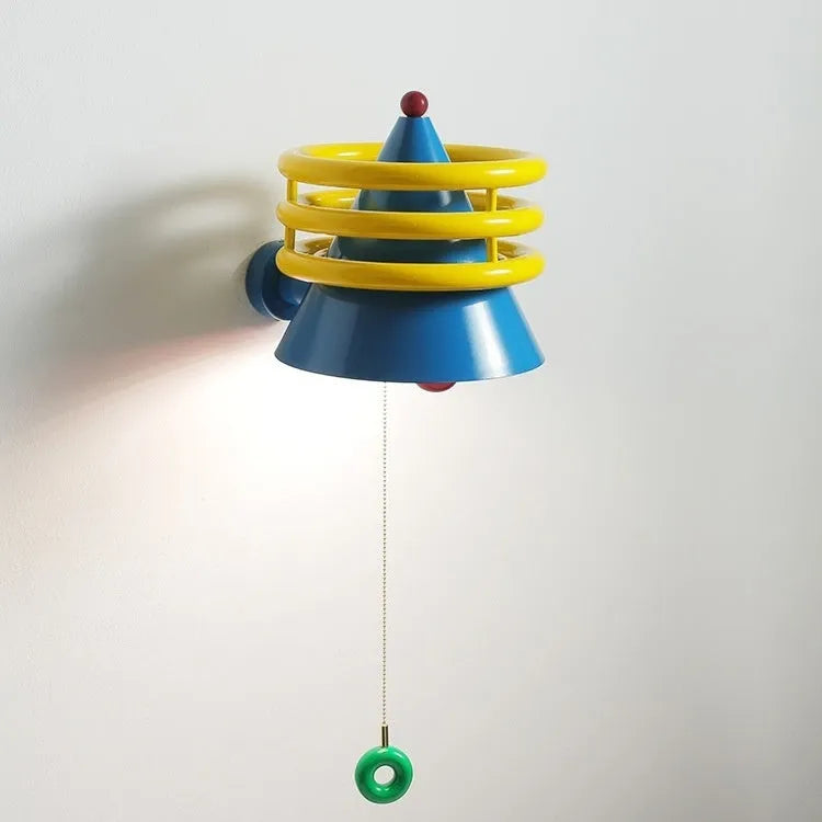 French cream wind belt bedhead wall light 25cm diameter with warm light option on bedroom wall