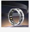 Polished silver smart ring with diamond inlay design on a finger, showing health tracking technology.