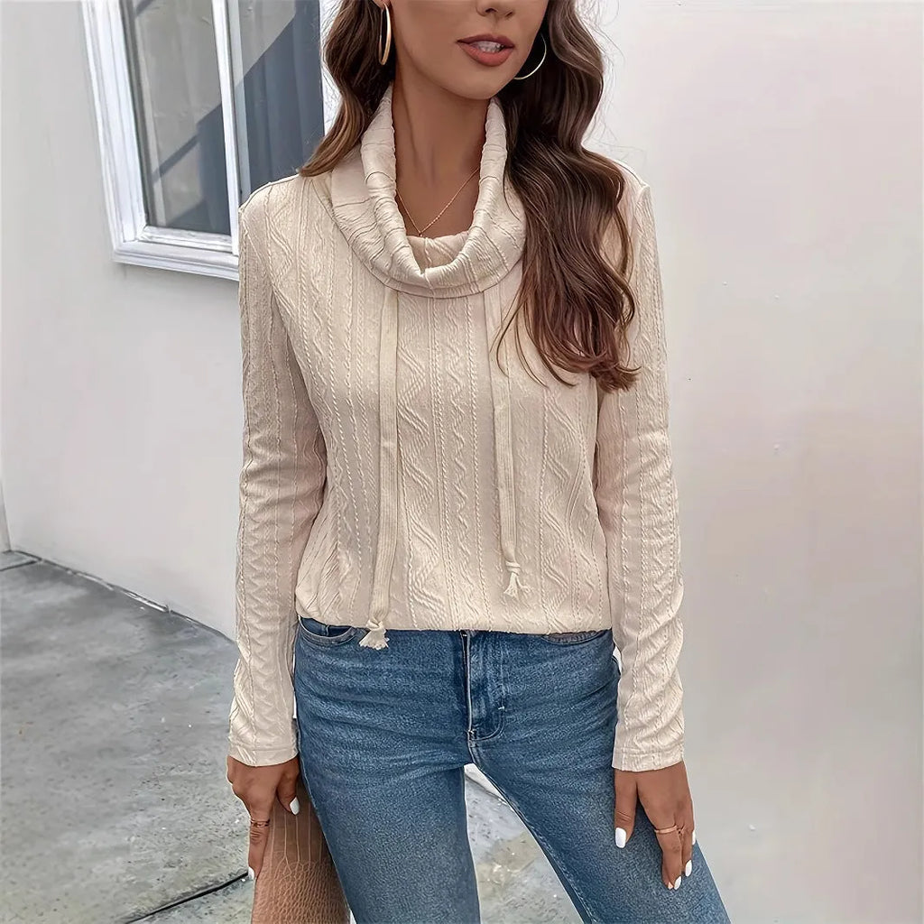 Apricot coloured hooded pullover sweater with long sleeves and drawstring hood