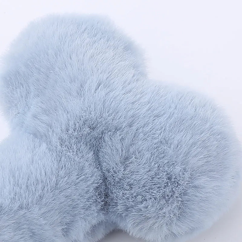 Love bone shaped plush dog toy in blue, pink or yellow colours with vocal interactive features