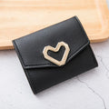 Ladies tri-fold PU leather wallet with magnetic buckle, card slots, ID space, coin pocket, and heart decoration