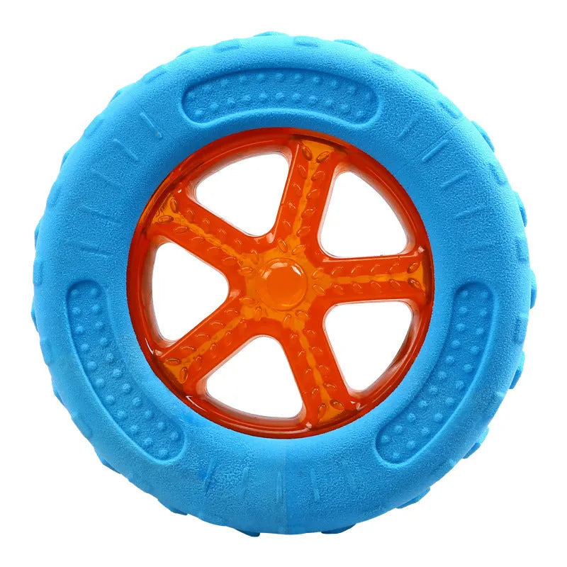 TPR squeaky dog toy set with ball, tires, and barbell floating in water