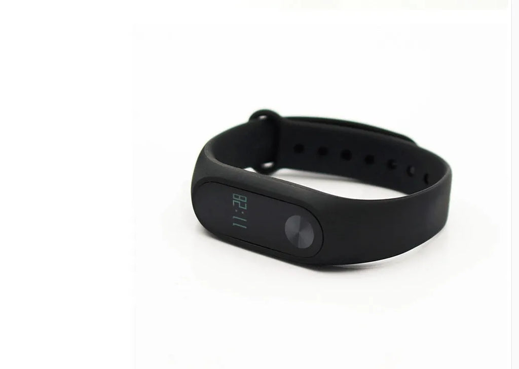 Xiaomi Mi Band 2 black fitness tracker with OLED screen on a wrist