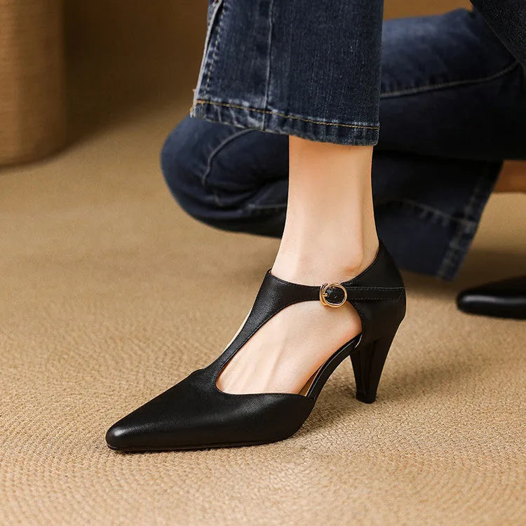 Brown retro women's T-strap closed-toe sandals with a 6-8cm heel on a wooden floor.