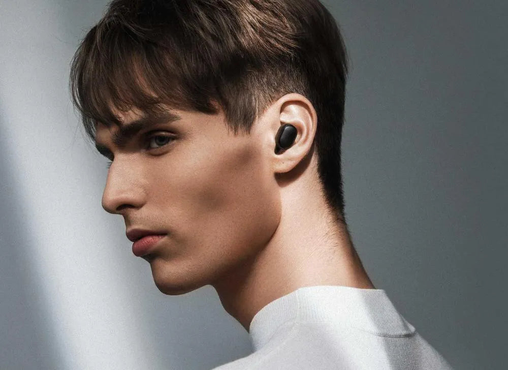 Redmi AirDots 2 Black true wireless Bluetooth earbuds and charging case on a white background.