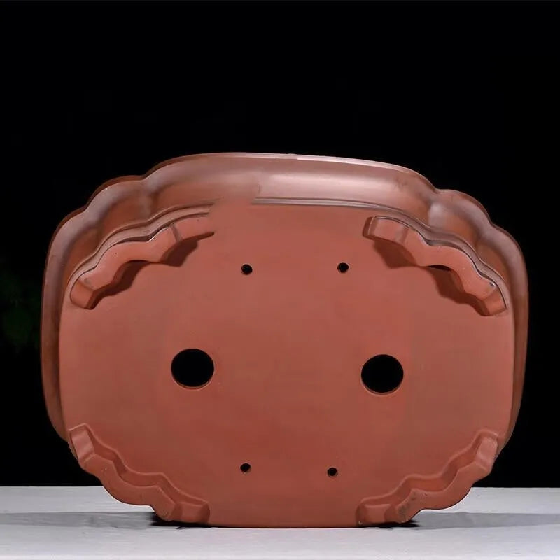 Chinese-style antique finish purple clay oval flowerpot measuring 71cm long by 54cm wide