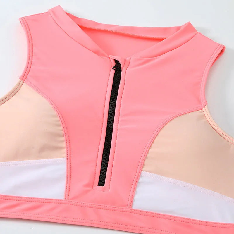 Pink high waist split bikini swimsuit set with matching bra on a neutral background