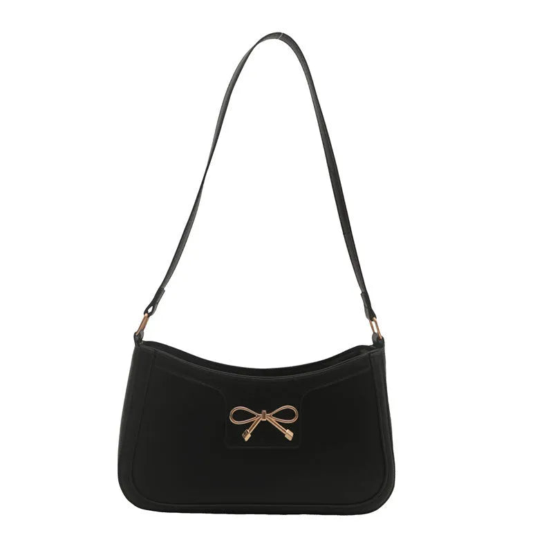 Western style baguette shoulder bag in six colours with 24x14x5cm dimensions and single strap