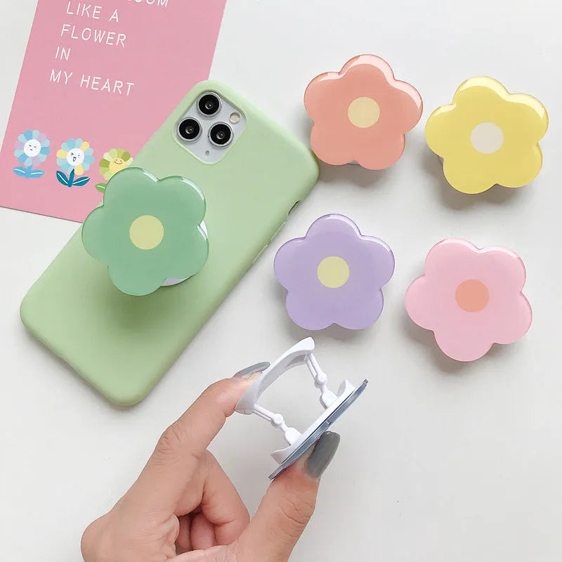 Plastic mobile phone airbag bracket desktop stand flower design colour options blue green orange pink purple yellow