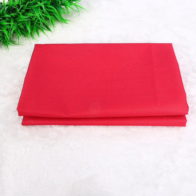 A square black waterproof car pet pad for dogs and cats on a car seat