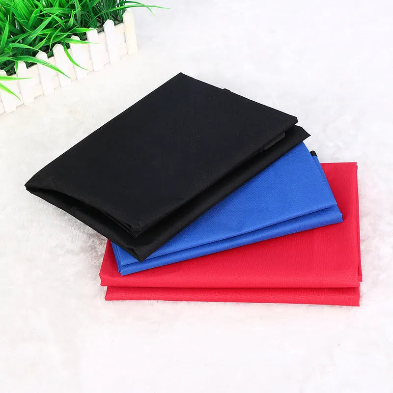 A square black waterproof car pet pad for dogs and cats on a car seat