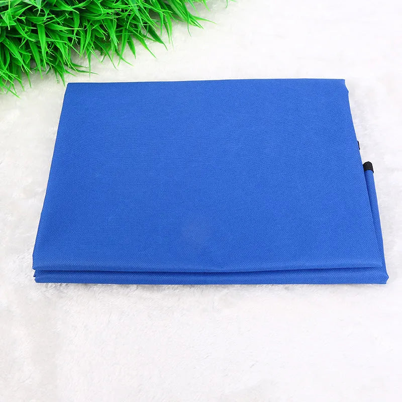 A square black waterproof car pet pad for dogs and cats on a car seat