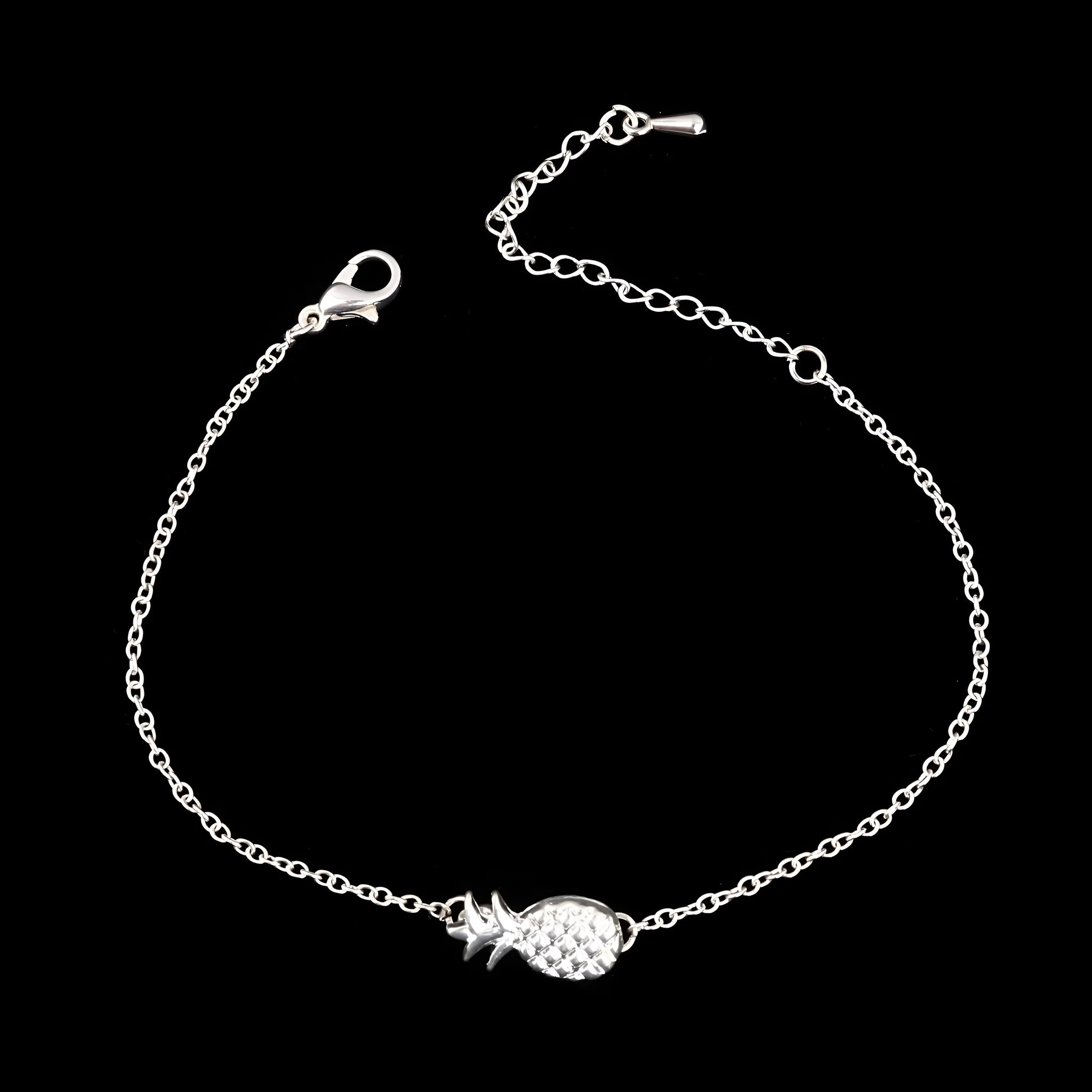 Gold or silver alloy bracelet with a detailed pineapple charm on a simple chain.