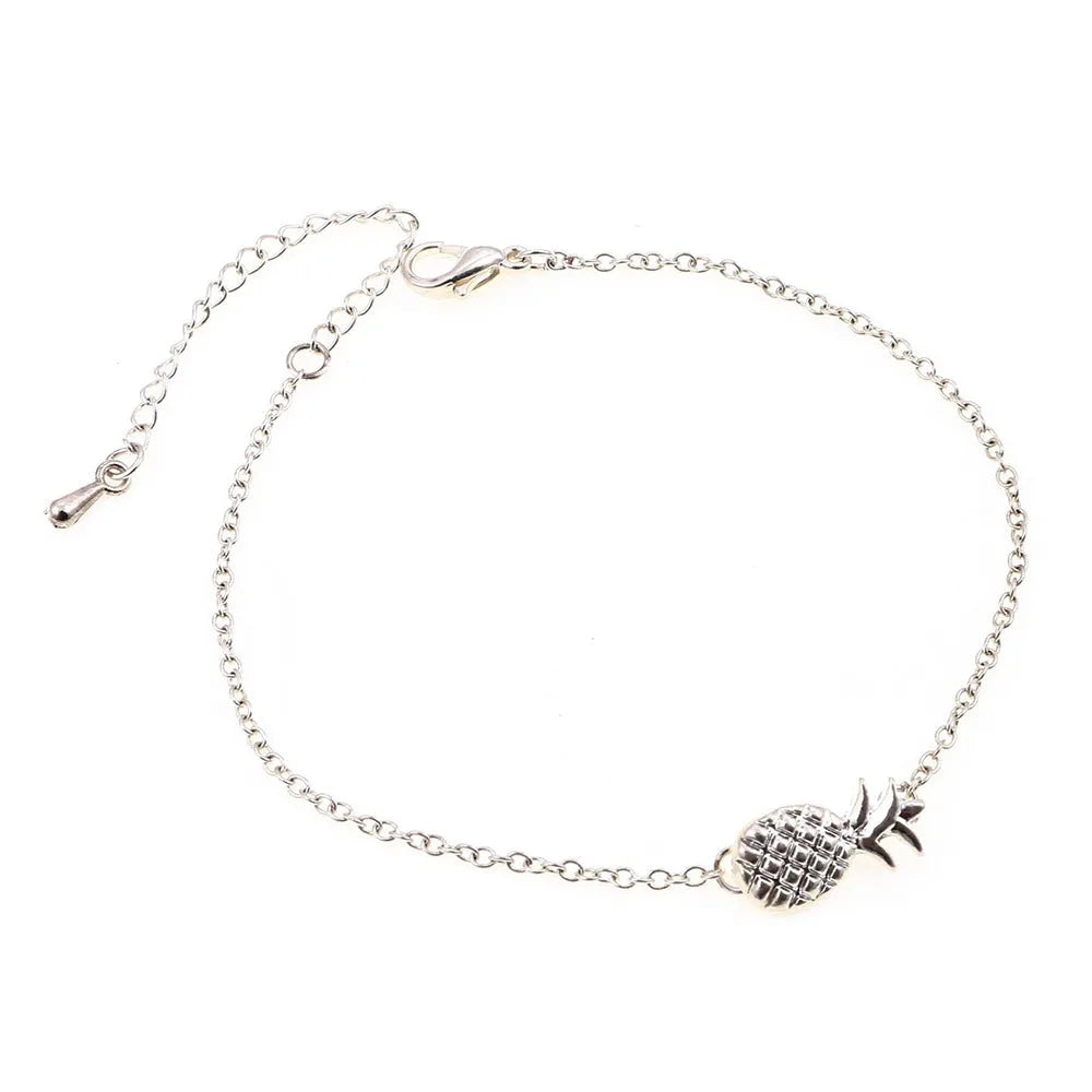 Gold or silver alloy bracelet with a detailed pineapple charm on a simple chain.