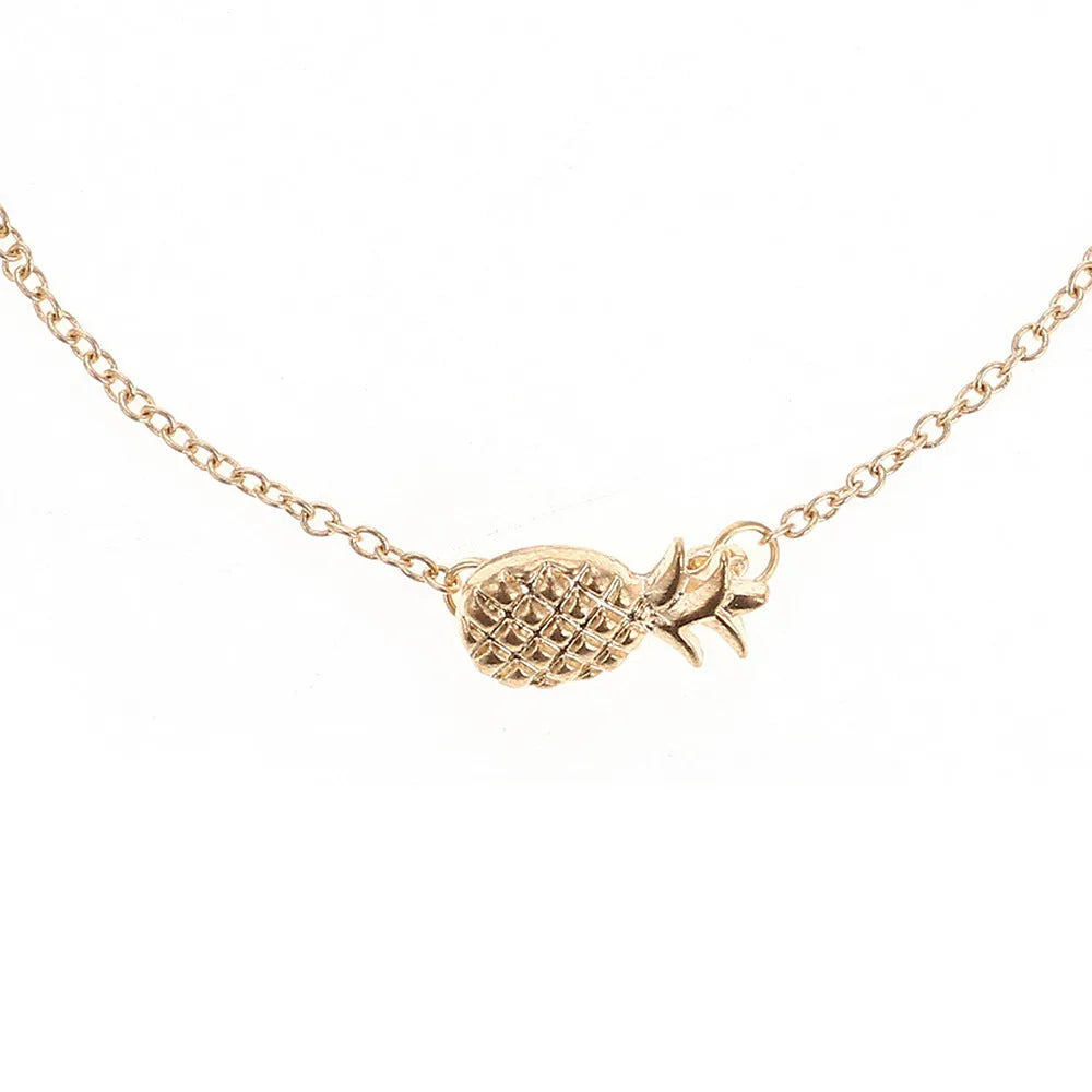 Gold or silver alloy bracelet with a detailed pineapple charm on a simple chain.