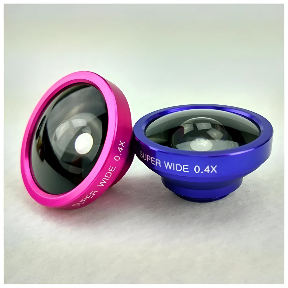 Smartphone 3-in-1 lens kit showing fisheye, wide angle, and macro lenses with universal clip