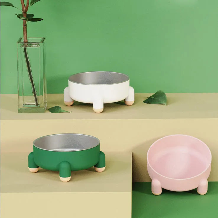 Stainless steel pet bowl with non-slip base in green, pink, and white colour options.